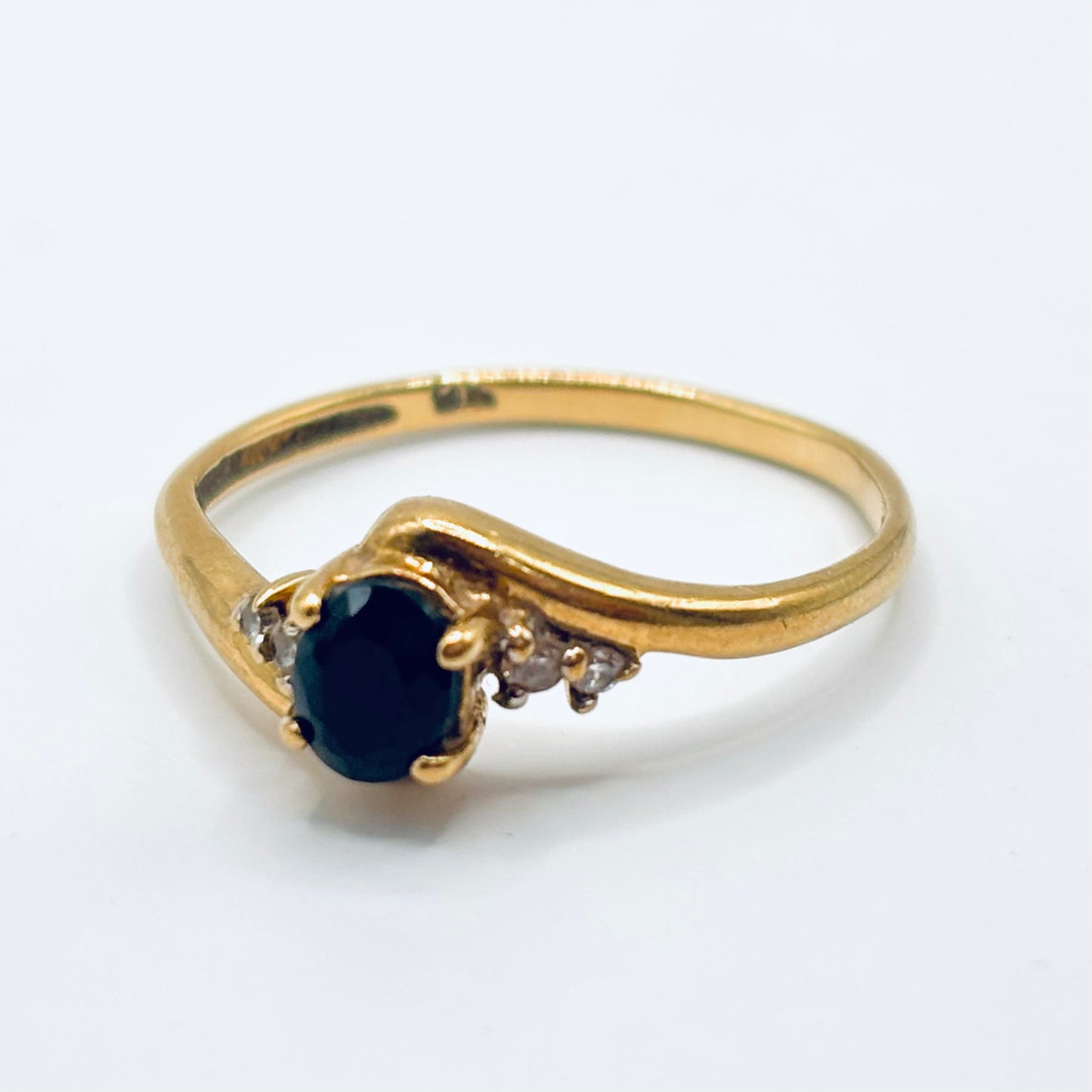 Vintage Gold Bypass ring with Oval Sapphire and Diamond Accents
