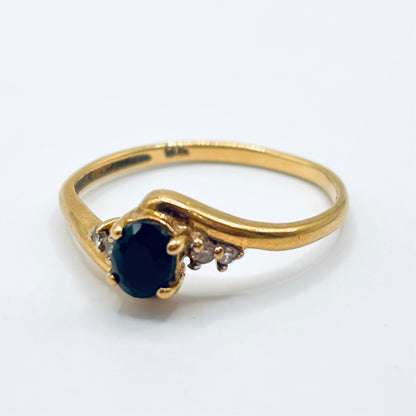 Vintage Gold Bypass ring with Oval Sapphire and Diamond Accents