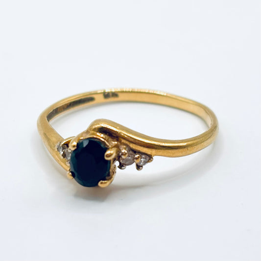 Vintage Gold Bypass ring with Oval Sapphire and Diamond Accents